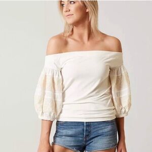 Free People Cream Blouse with Ruffled Asymmetrical Design and Short Sleeves